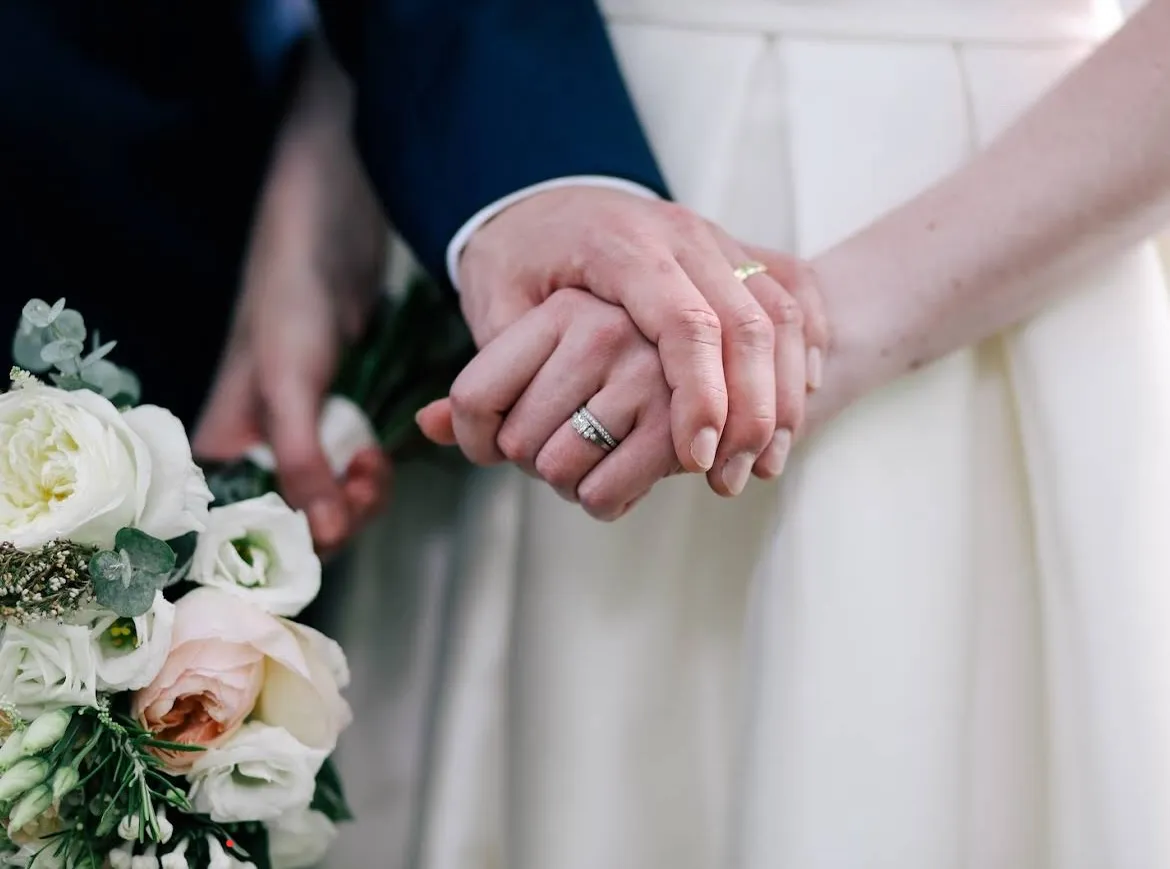 Hands with bouquet